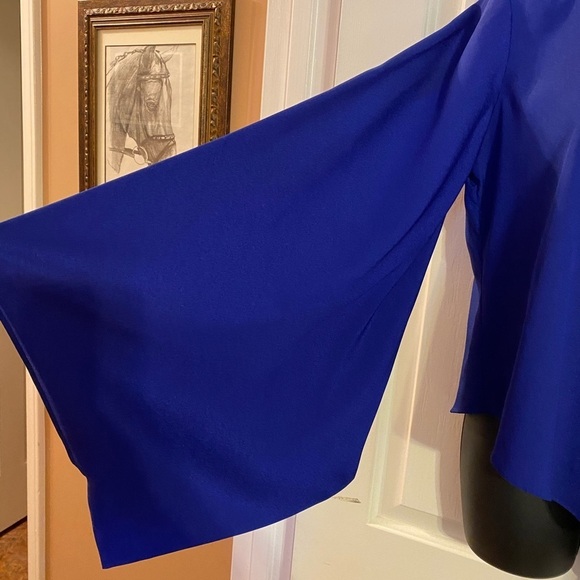 “BEBE” Brielle Bell Sleeve Asymmetrical Blouse - Picture 5 of 12